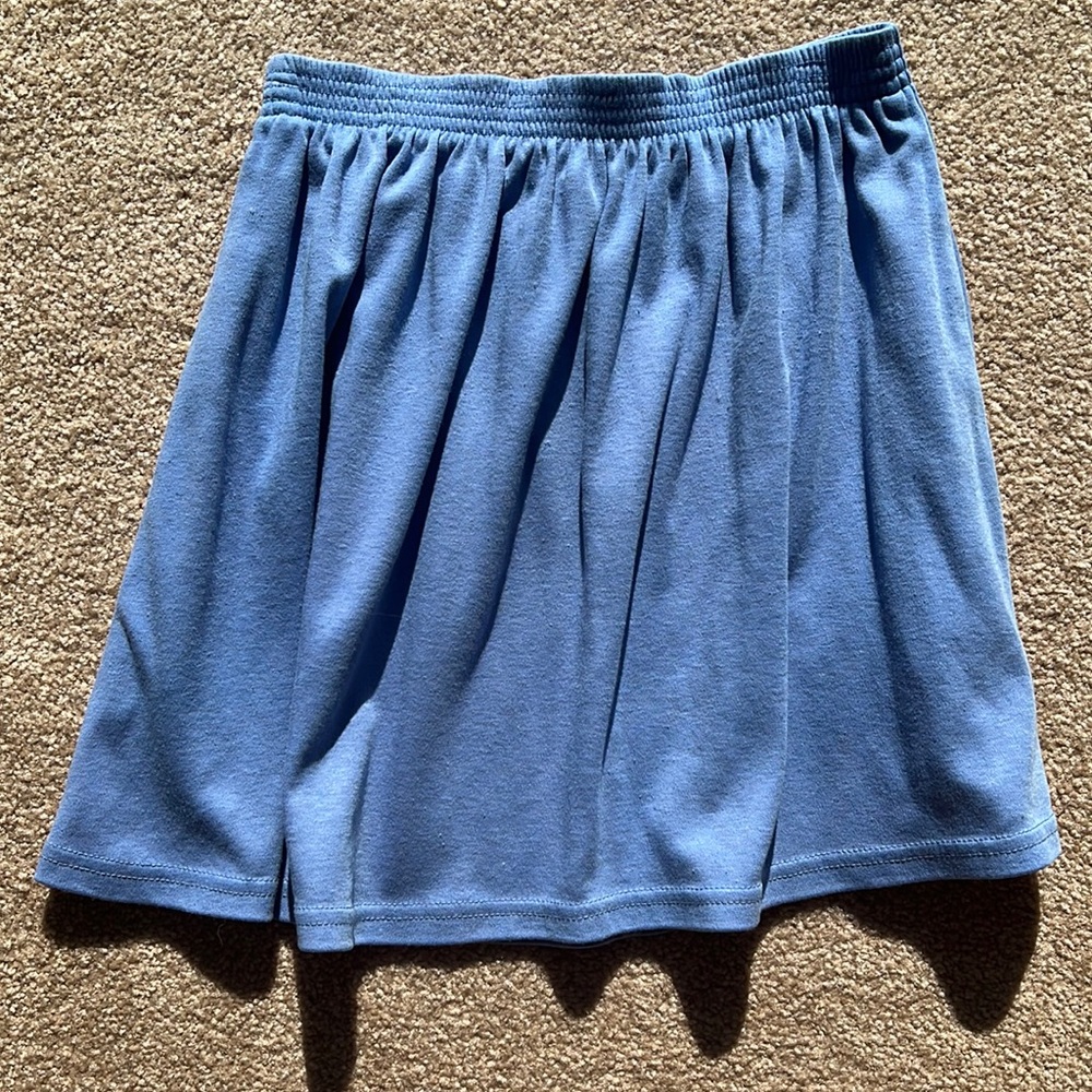 Elastic band comfortable indigo blue cornflower colored skirt with two pockets